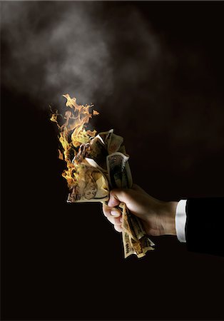 fire in hands - Human Hand With Burning Bank Notes Foto de stock - Con derechos protegidos, Código: 859-06354580