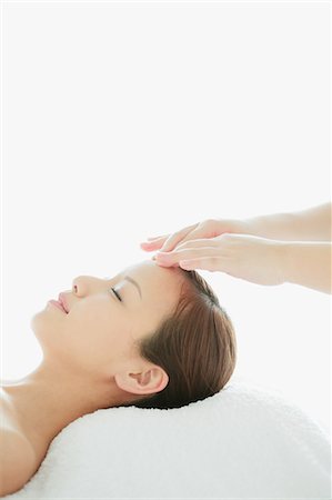 side profile face smile - Japanese woman receiving an head massage Stock Photo - Rights-Managed, Code: 859-06404805