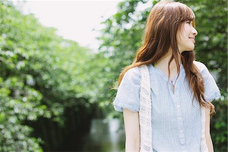 simsearch:622-06900452,k - Japanese woman with long hair looking away Stock Photo - Rights-Managed, Code: 859-06404868
