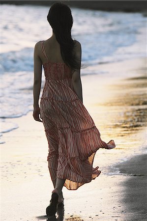 people at beach fashion picture - Japanese woman in a long dress walking away at the beach Stock Photo - Rights-Managed, Code: 859-06404895