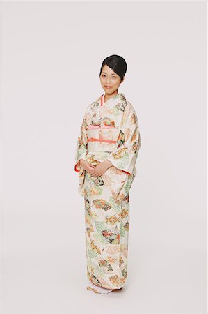 elegant pattern - Japanese woman in a kimono looking at camera Stock Photo - Rights-Managed, Code: 859-06405003