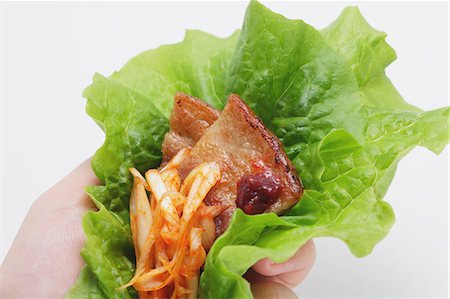 Hand holding Korean traditional Samgyeopsal Stock Photo - Rights-Managed, Code: 859-06469716