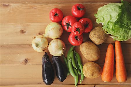 pisum sativum - Mixed vegetables on a wooden table Stock Photo - Rights-Managed, Code: 859-06470005