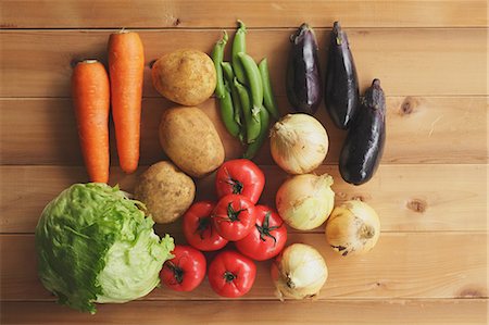 pisum sativum - Mixed vegetables on a wooden table Stock Photo - Rights-Managed, Code: 859-06470006