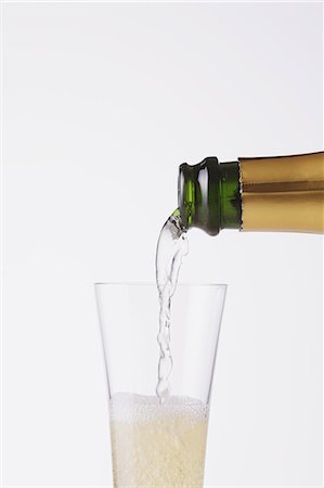 sparkling wine - Pouring Champagne in a glass Stock Photo - Rights-Managed, Code: 859-06470033
