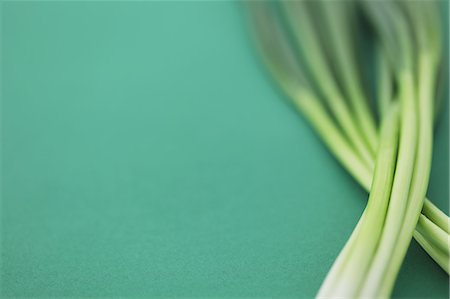 fresh food - Green onions on green background Stock Photo - Rights-Managed, Code: 859-06470072