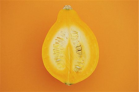 seasonal food - Puccini pumpkin on yellow background Stock Photo - Rights-Managed, Code: 859-06470086