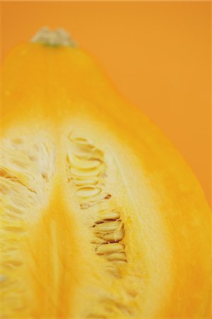 seasonal food - Puccini pumpkin on yellow background Stock Photo - Rights-Managed, Code: 859-06470087