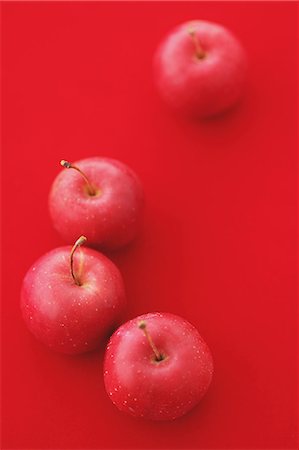 seasonal food - Red apples on red background Stock Photo - Rights-Managed, Code: 859-06470145