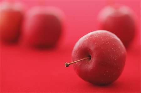 Red apples on red background Stock Photo - Rights-Managed, Code: 859-06470147