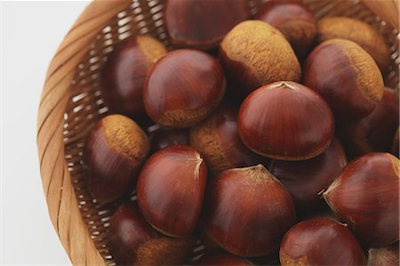 seasonal food - Chestnuts in a wooden basket Stock Photo - Rights-Managed, Code: 859-06470159