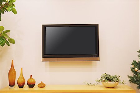 plant living room nobody - LCD TV hanging on the wall and plants Foto de stock - Con derechos protegidos, Código: 859-06470185