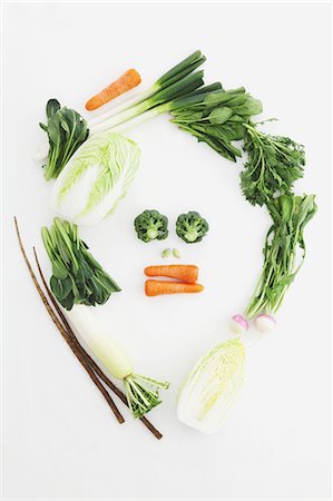 Mixed vegetables arranged in a face Stockbilder - Lizenzpflichtiges, Bildnummer: 859-06470252