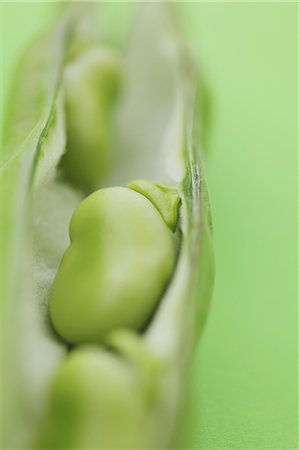 pisum sativum - Broad beans on green background Stock Photo - Rights-Managed, Code: 859-06470275