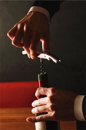 Sommelier opening a bottle of wine Stock Photo - Rights-Managed, Code: 859-06537792