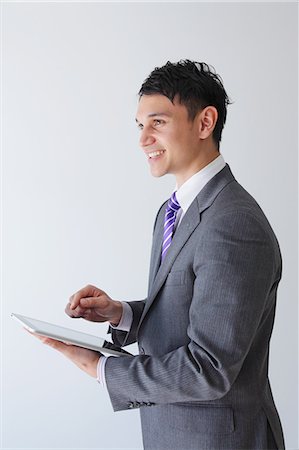 Businessman with tablet Stock Photo - Rights-Managed, Code: 859-06537816