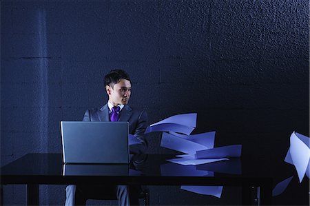 flotante - Businessman working Photographie de stock - Rights-Managed, Code: 859-06537875