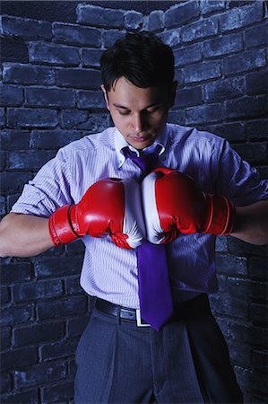 simsearch:859-06537881,k - Businessman with boxing gloves Foto de stock - Con derechos protegidos, Código: 859-06537878
