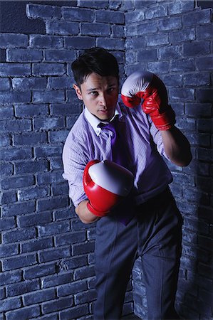 simsearch:859-06537881,k - Businessman with boxing gloves Foto de stock - Con derechos protegidos, Código: 859-06537880