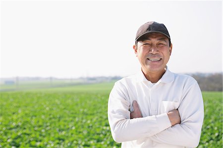 pictures of farmers hat - Farmer smiling at camera Stock Photo - Rights-Managed, Code: 859-06537908