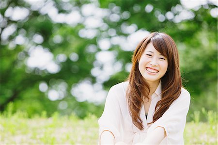 Young woman smiling at camera Stock Photo - Rights-Managed, Code: 859-06538066