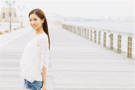 Young woman looking at camera Stock Photo - Rights-Managed, Code: 859-06538093