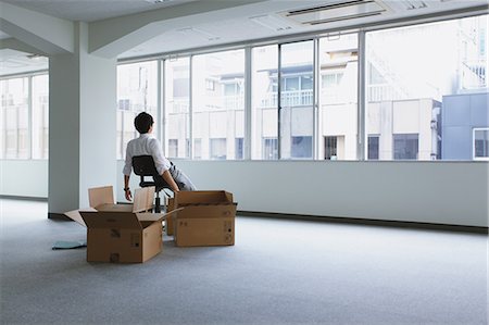 sitting in office tired - Office moving Stock Photo - Rights-Managed, Code: 859-06538171