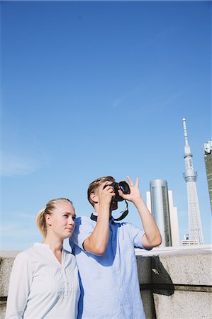 simsearch:859-08993839,k - Tourist couple visiting Tokyo Foto de stock - Con derechos protegidos, Código: 859-06538248