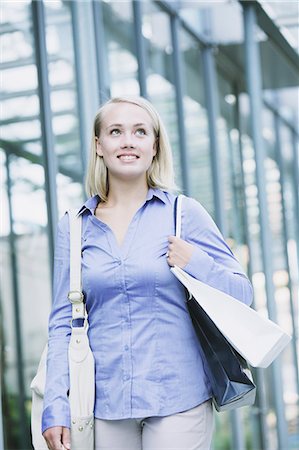 small town shopping - Young woman shopping Photographie de stock - Rights-Managed, Code: 859-06538279