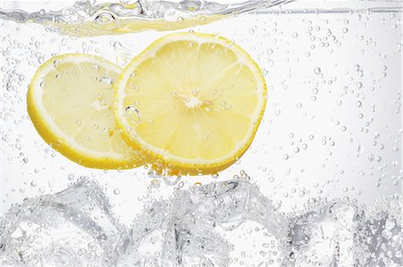 fine food - Sparkling Water With Ice And Cut Lemon Stock Photo - Rights-Managed, Code: 859-06617307