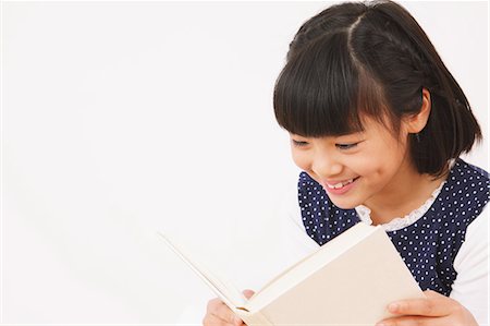 Girl Reading a Book Stock Photo - Rights-Managed, Code: 859-06617344