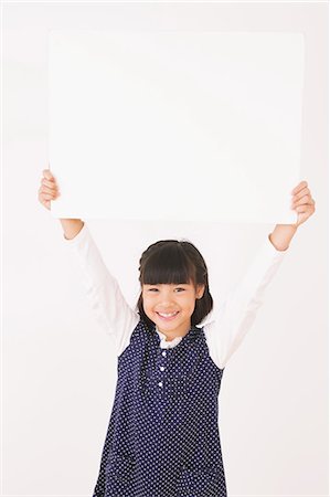 Girl With White Board Stock Photo - Rights-Managed, Code: 859-06617343