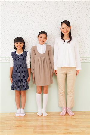 sibling - Mother And Daughters Standing Stock Photo - Rights-Managed, Code: 859-06617381