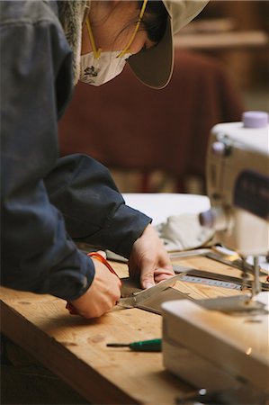 sewing machine factory - Craftsman Working Stock Photo - Rights-Managed, Code: 859-06617424