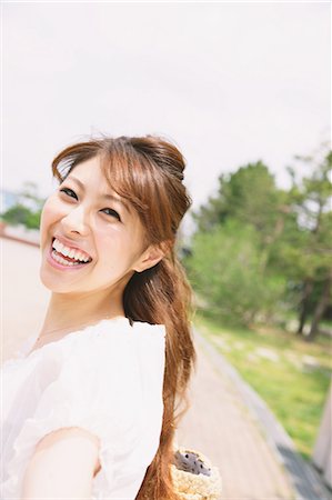 Woman Smiling at Camera Photographie de stock - Rights-Managed, Code: 859-06617462