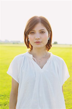 prairie - Woman Looking at Camera Photographie de stock - Rights-Managed, Code: 859-06617514