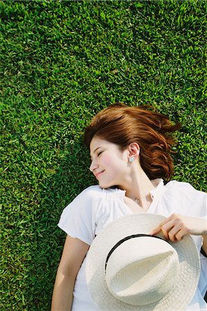 Woman Relaxing In a Meadow Stock Photo - Rights-Managed, Code: 859-06617510