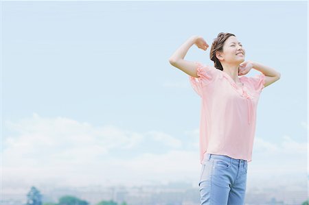 simsearch:859-06617522,k - Japanese woman smiling with closed eyes Stock Photo - Rights-Managed, Code: 859-06710942