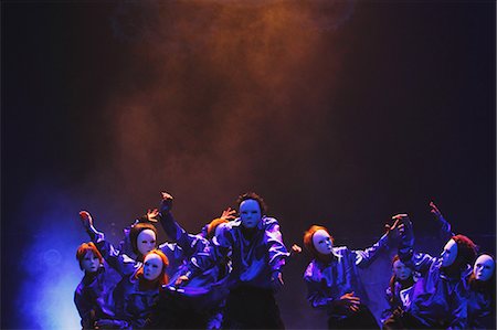 Group of dancers wearing masks Photographie de stock - Rights-Managed, Code: 859-06711138