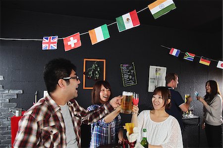 friends at table in a bar - Young people having a drink in a bar Stock Photo - Rights-Managed, Code: 859-06711146