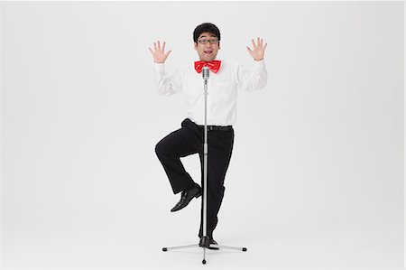 picture of human standing - Comedian performing Stock Photo - Rights-Managed, Code: 859-06711152