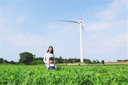 people clean nature - Mother and daughter in a field smiling at camera Stock Photo - Rights-Managed, Code: 859-06808473