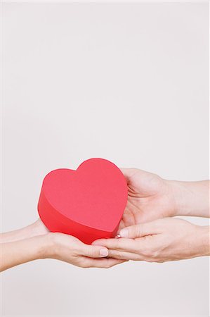 symbol present - Hands and heart Stock Photo - Rights-Managed, Code: 859-06808652