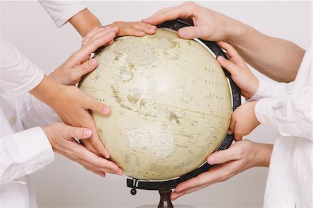 earth and hand - Hands on globe Stock Photo - Rights-Managed, Code: 859-06808674