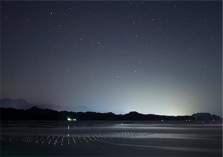 starry - Night Sky and Calm Sea Foto de stock - Con derechos protegidos, Código: 859-07441520
