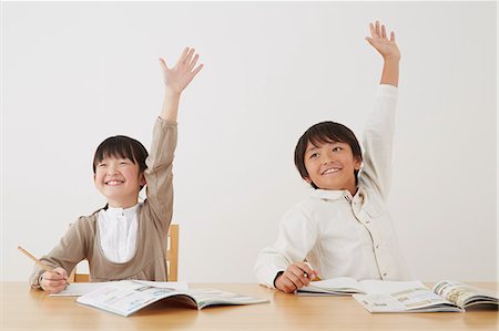 simsearch:859-07710990,k - Kids doing their homework on wooden desk Stock Photo - Rights-Managed, Code: 859-07711009