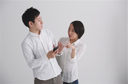 Young Japanese couple having an argument Foto de stock - Direito Controlado, Número: 859-07711151