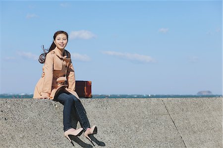 embankment - Japanese woman near the sea Photographie de stock - Rights-Managed, Code: 859-07845814