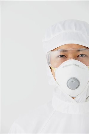 Young Japanese man in a protective suit Photographie de stock - Rights-Managed, Code: 859-08008330