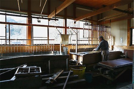 Japanese traditional paper craftsman working in his studio Stock Photo - Rights-Managed, Code: 859-08173145